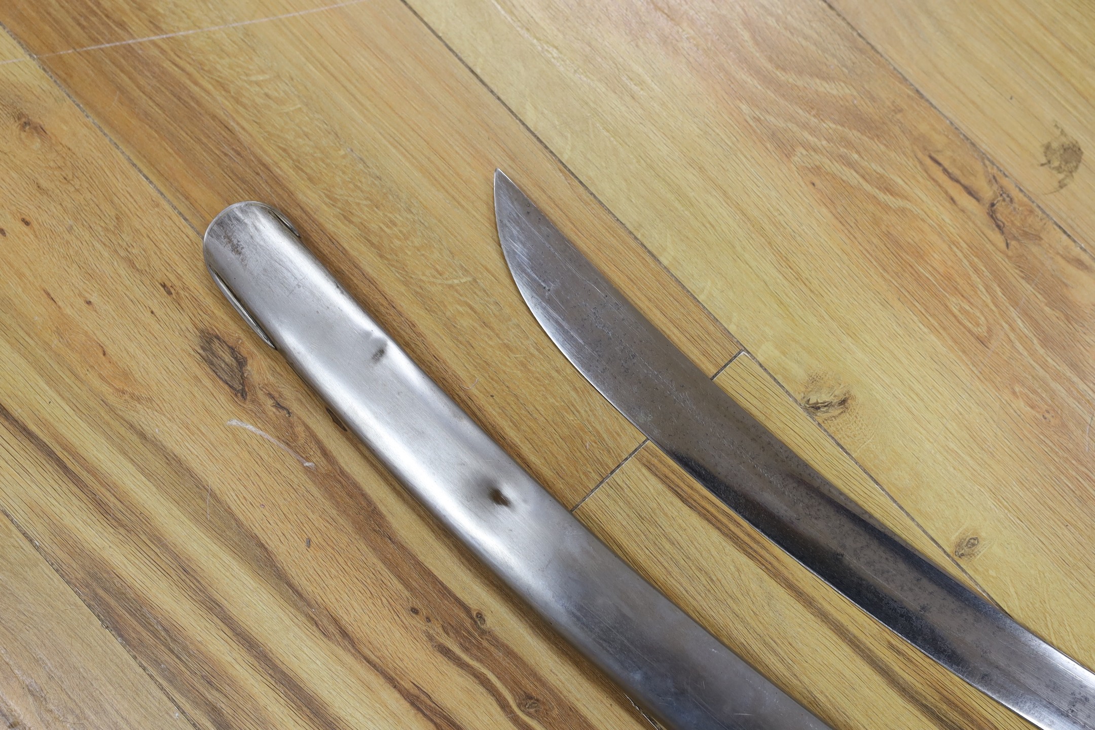 A British pattern 1796 light cavalry sabre, ‘W.S.R.’ engraved to hilt and ‘Bats’? to spine, with steel scabbard. 99cm total length